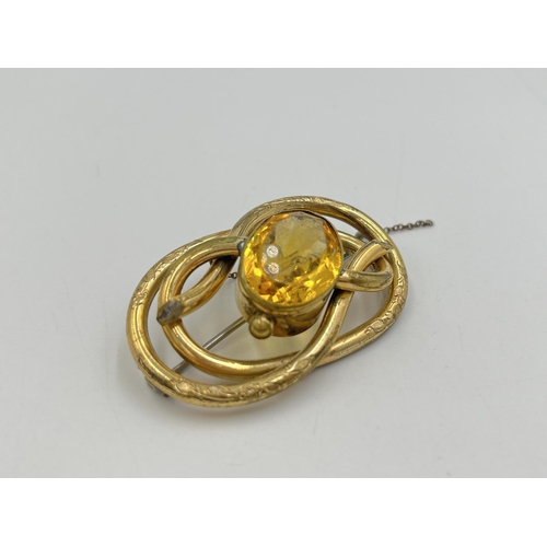 2277 - An antique yellow metal citrine set brooch with base metal pin - approx. gross weight 22g and 3.5cm ... 