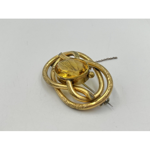 2277 - An antique yellow metal citrine set brooch with base metal pin - approx. gross weight 22g and 3.5cm ... 