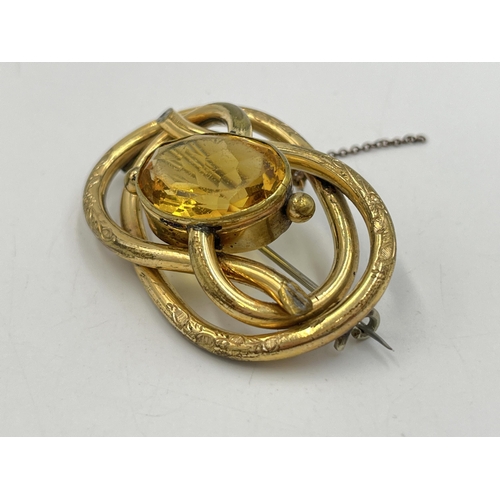 2277 - An antique yellow metal citrine set brooch with base metal pin - approx. gross weight 22g and 3.5cm ... 