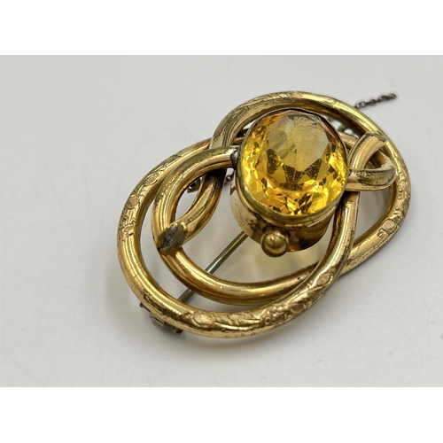 2277 - An antique yellow metal citrine set brooch with base metal pin - approx. gross weight 22g and 3.5cm ... 