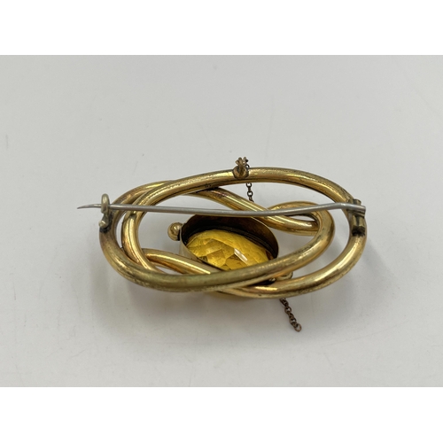 2277 - An antique yellow metal citrine set brooch with base metal pin - approx. gross weight 22g and 3.5cm ... 