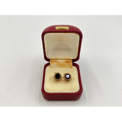 2278 - A pair of 9ct gold garnet set earrings - approx. gross weight 1.3g