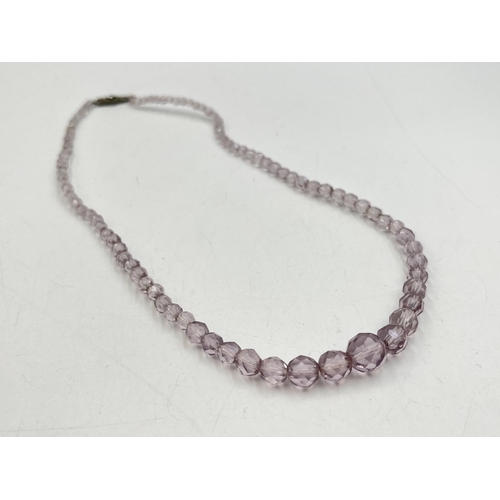 2282 - A pink faceted beaded necklace with 18ct white gold diamond set clasp