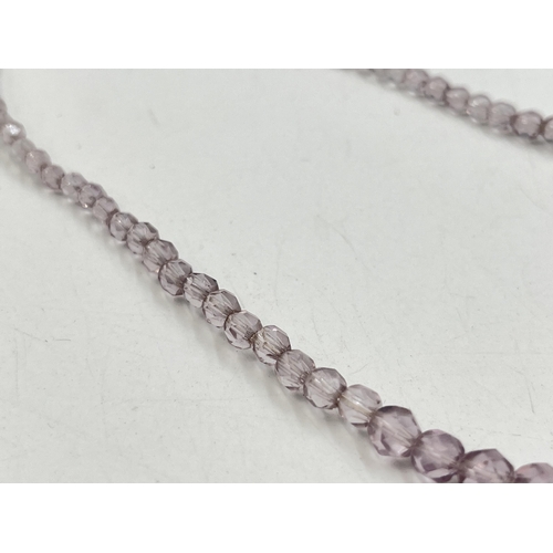 2282 - A pink faceted beaded necklace with 18ct white gold diamond set clasp