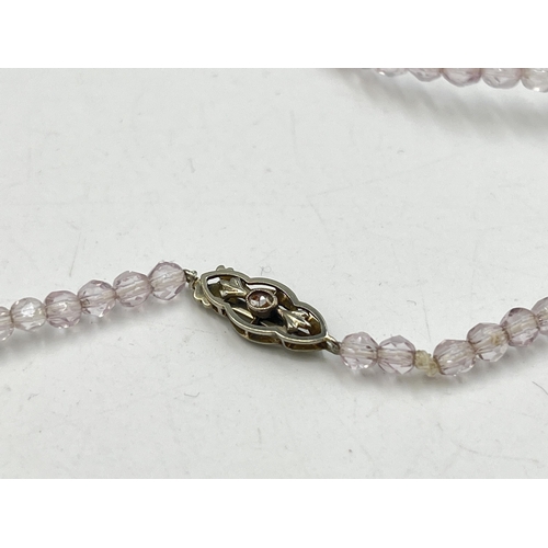 2282 - A pink faceted beaded necklace with 18ct white gold diamond set clasp