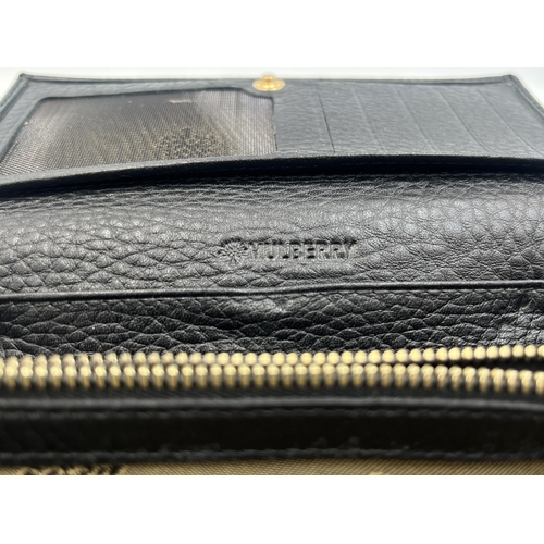 2293 - A Mulberry black leather lady's purse - approx. 10cm high x 18cm wide