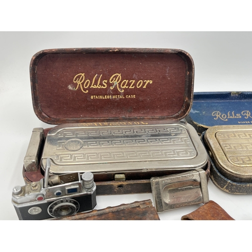 2298 - A collection of items to include mid 20th century Japanese K.K.W. Camera Lighter, Coldstream Guards ... 