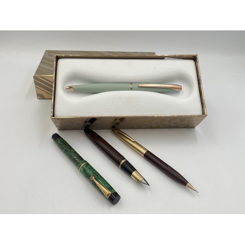 2302 - Four writing instruments, one Sheaffer fountain pen with 14ct gold nib, one Sheaffer propelling penc... 