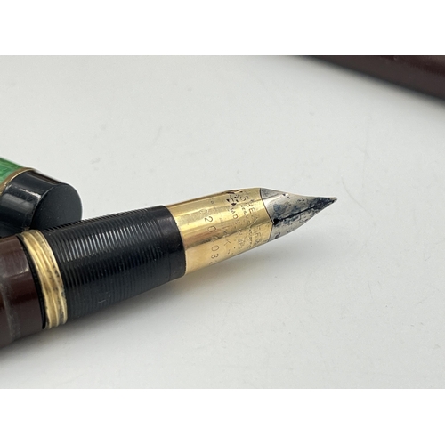 2302 - Four writing instruments, one Sheaffer fountain pen with 14ct gold nib, one Sheaffer propelling penc... 