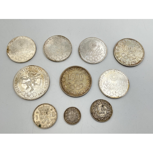 2320 - A collection of silver coins to include four 62.5% 1972 'Munich Olympics' 10 Deutsche Marks, 72% 196... 