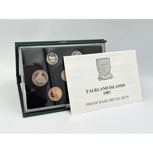 2344 - Three boxed and cased Royal Mint proof sets, one 1988 Hong Kong seven coin, one 1987 Falkland Island... 