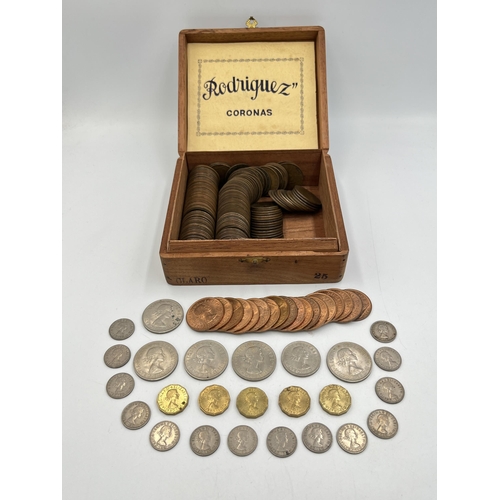 2347 - A wooden cigar box containing British pre-decimal coins