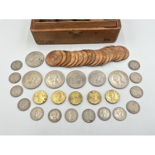 2347 - A wooden cigar box containing British pre-decimal coins