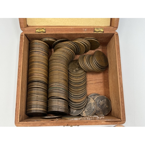 2347 - A wooden cigar box containing British pre-decimal coins