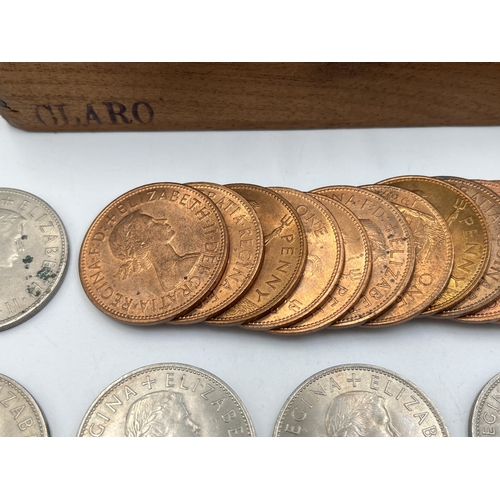 2347 - A wooden cigar box containing British pre-decimal coins