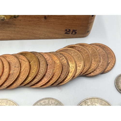 2347 - A wooden cigar box containing British pre-decimal coins