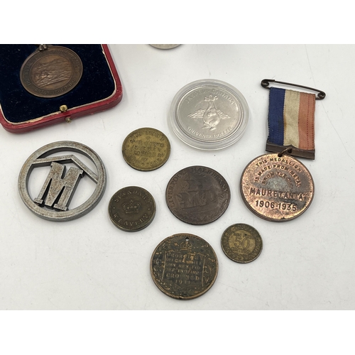 2349 - A collection of medals and tokens to include cased 1914 The Royal Life Saving Society medal awarded ... 