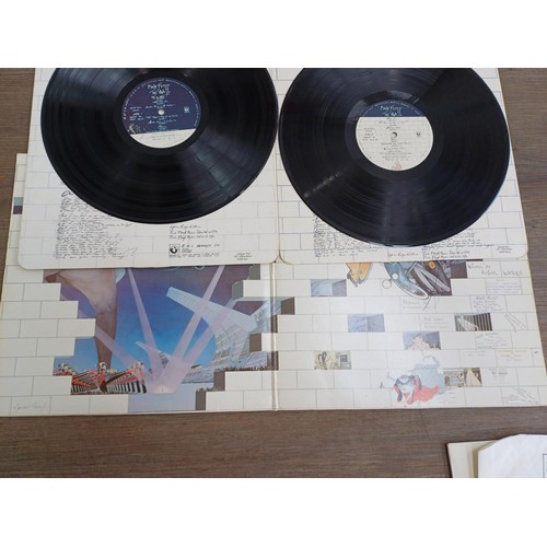 748 - Four Pink Floyd LP vinyl records, 'The Wall' (side 1 matrix SHSP 4111 A-9U TML-M 1), 'Relics', 'Wish... 