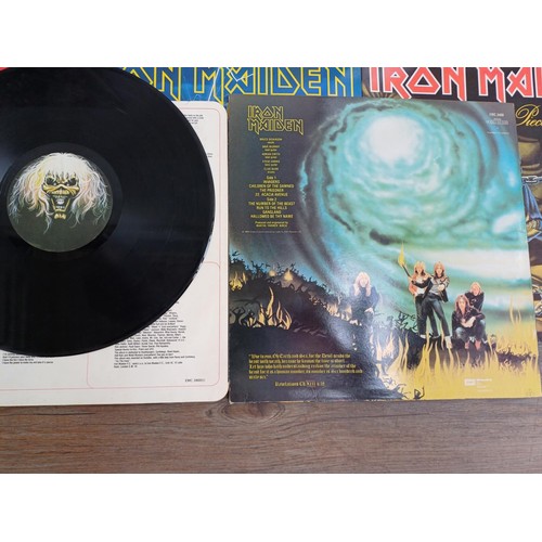 758 - Six Iron Maiden LP vinyl records to include three 'The Number of the Beast' (two are fame and one is... 