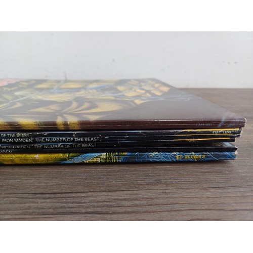 758 - Six Iron Maiden LP vinyl records to include three 'The Number of the Beast' (two are fame and one is... 