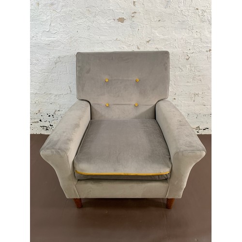 233A - A pair of mid 20th century grey and mustard yellow button back velvet upholstered armchairs - approx... 