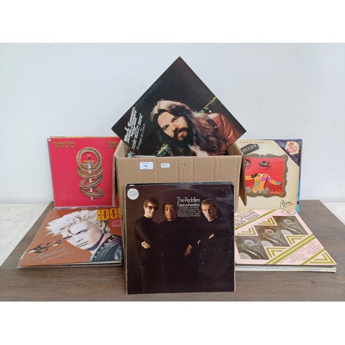 788 - A collection of vinyl records to include Joan Baez, The Who (picture disc), Snow Patrol (picture dis... 