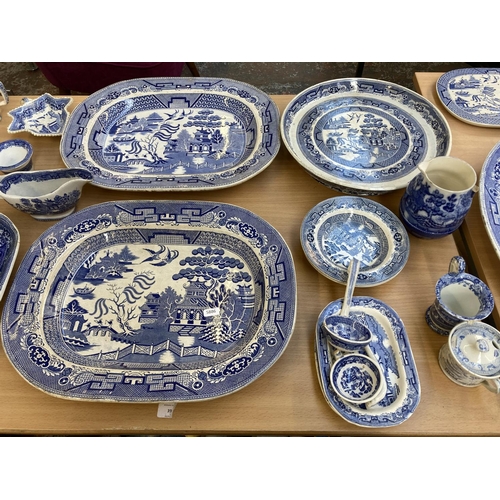 391 - A collection of 19th century and later Willow Pattern china to include WE stoneware meat plate, Maso... 