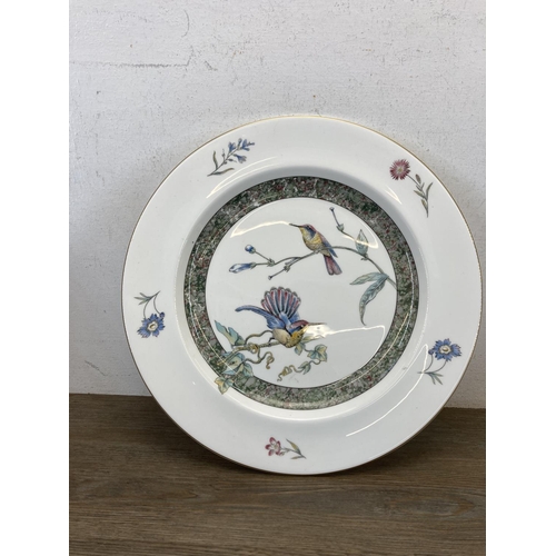 397 - A collection of Wedgwood Hummingbirds bone china to include cup and saucer, three photo frames, mant... 