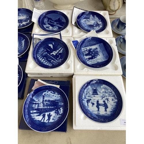 399 - Seventeen Danish porcelain collector's plates, sixteen Royal Copenhagen Christmas and one Bing & Gro... 