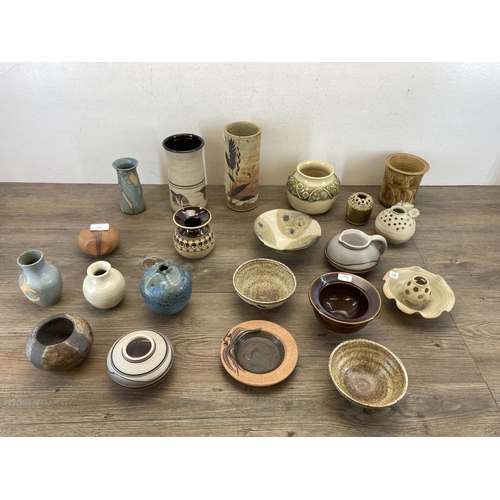 412 - Twenty one pieces of studio pottery