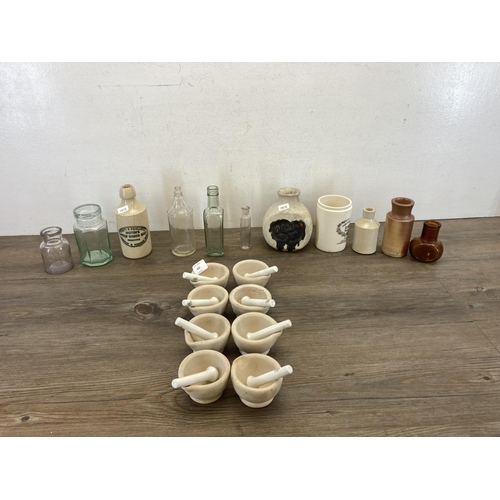 415 - A collection of ceramics and glassware to include studio pottery vase, eight warranted acid proof mo... 