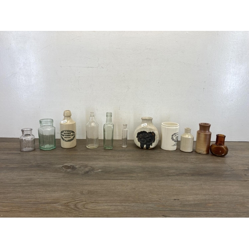 415 - A collection of ceramics and glassware to include studio pottery vase, eight warranted acid proof mo... 