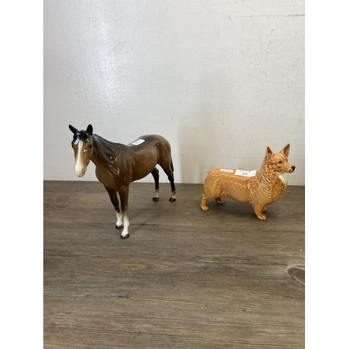 429 - Five Beswick figurines, four horses and one corgi dog