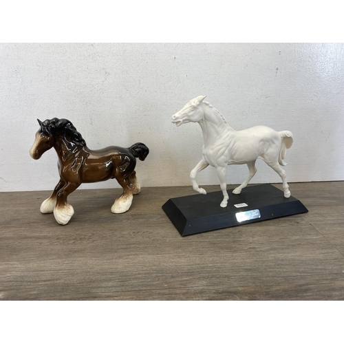 429 - Five Beswick figurines, four horses and one corgi dog