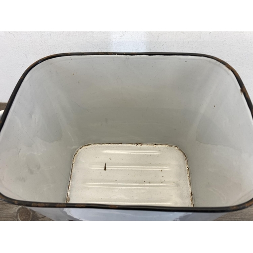 448 - A mid 20th century white enamel twin handled lidded bread bin - approx. 31cm high x 39cm wide x 25cm... 