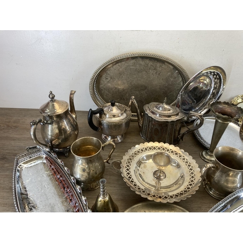 450 - A collection of antique and later metalware to include Victorian Walker & Hall silver plated teapot,... 