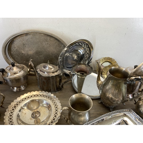 450 - A collection of antique and later metalware to include Victorian Walker & Hall silver plated teapot,... 