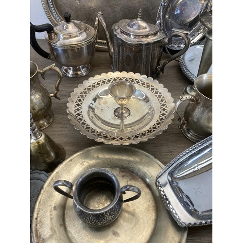 450 - A collection of antique and later metalware to include Victorian Walker & Hall silver plated teapot,... 