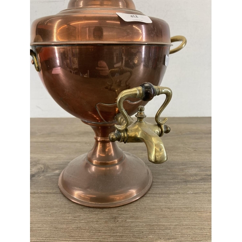 452 - A 19th century copper and brass samovar - approx. 37cm high