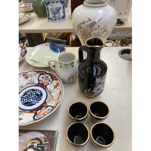 440 - A collection of Oriental ceramics to include Imari scalloped plate, Kutani twin handled lidded sugar... 