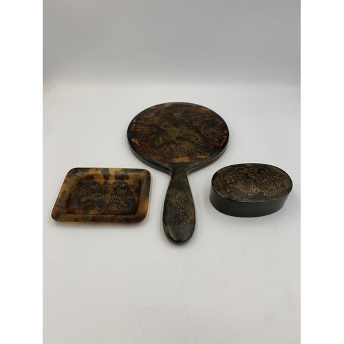 2311 - An early 20th century Chinese faux tortoiseshell three piece dressing table set