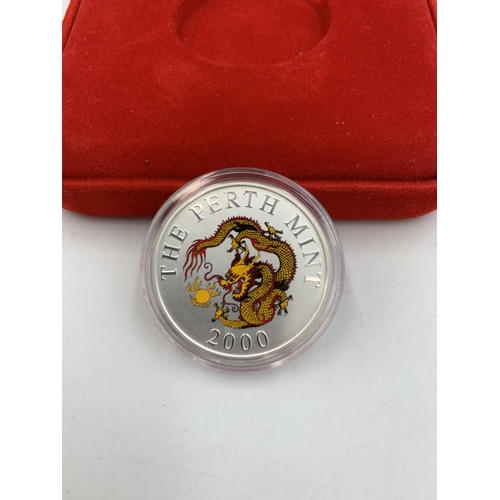 2316 - A cased The Perth Mint Year 2000 Exhibition 0.50 silver Golden Dragon medallion, limited edition 993... 