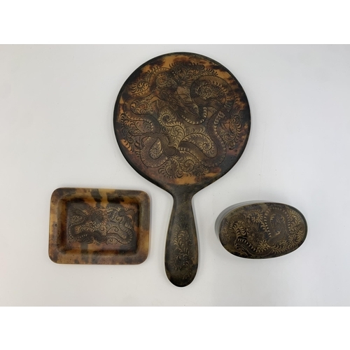 2311 - An early 20th century Chinese faux tortoiseshell three piece dressing table set