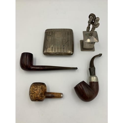 2312 - Five pieces of tobacciana to include mid 20th century Shive table lighter, K & P Peterson's pipe, Vi... 