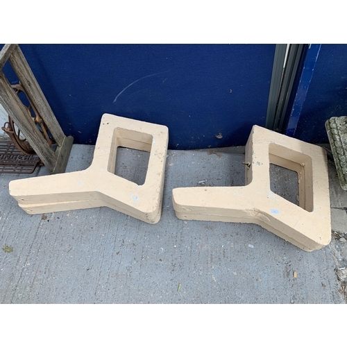 253 - Two pairs of painted cast stone garden bench ends