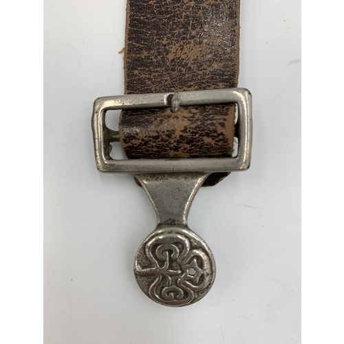 2310 - A vintage Girl Guides Association leather belt with attached The Acme City Whistle and Taylor Sheffi... 