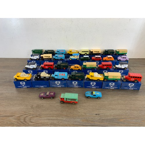 513 - A collection of boxed Corgi Made for Fina diecast model vehicles