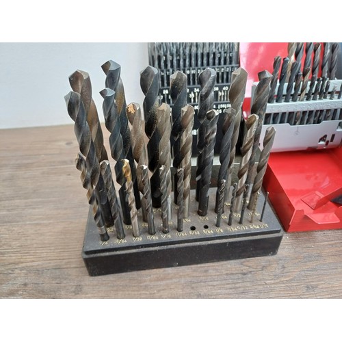1064 - Two boxes, one containing a large quantity of cased mostly Dormer drill bit sets and one containing ... 