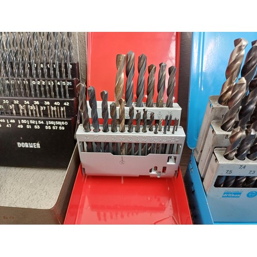 1064 - Two boxes, one containing a large quantity of cased mostly Dormer drill bit sets and one containing ... 