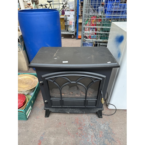 896 - A Dunelm 30162412 log burning stove effect electric heater - approx. 66cm high